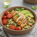 Freshly grilled chicken with colorful quinoa salad in a bowl / 2