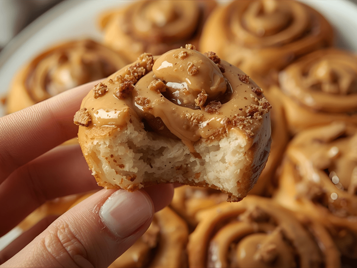 Biscoff Cookie Butter Cinnamon Rolls with cream cheese icing in a 9×13 pan.