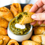 Antojitos pinwheels plated with chopped green onion garnish; best appetizer recipes pick.​​