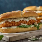 Breaded chicken sandwich with caesar dressing.