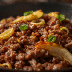 Cooking Low Carb Mongolian Ground Beef and Cabbage in a large pan.