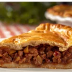 Old-Time Mincemeat Pie decorated with lattice pastry, perfect for a holiday gathering or traditional family recipe boards.