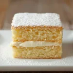 Detailed shot of a Vanilla Magic Custard Cake, a simple vanilla custard cake perfect for family gatherings and quick desserts.