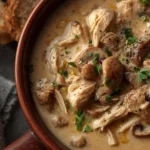 Rotisserie Chicken Mushroom Soup in a ceramic bowl.